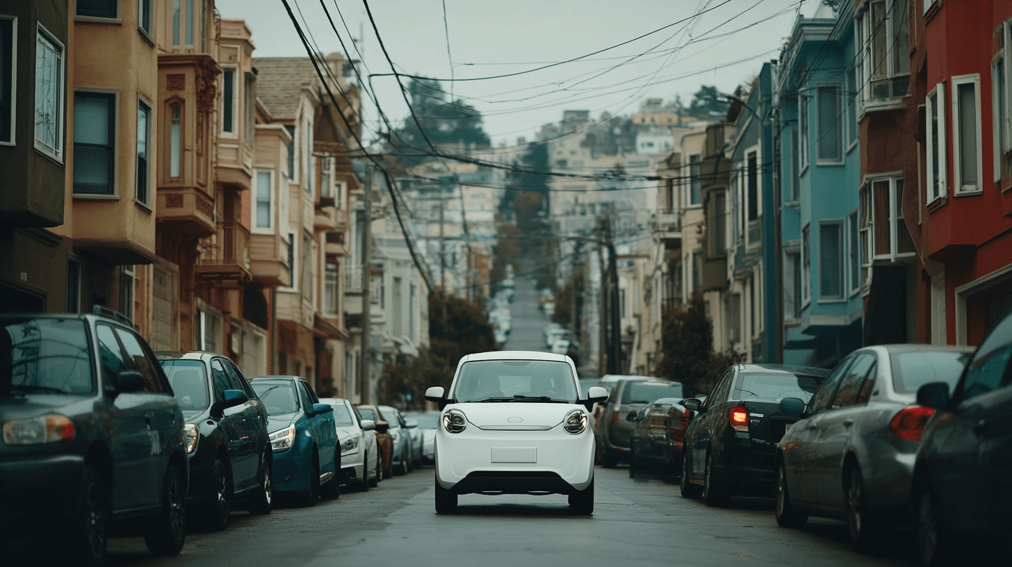 The Wink Mark3 head-on, climbing a San Francisco street lined with parked cars
